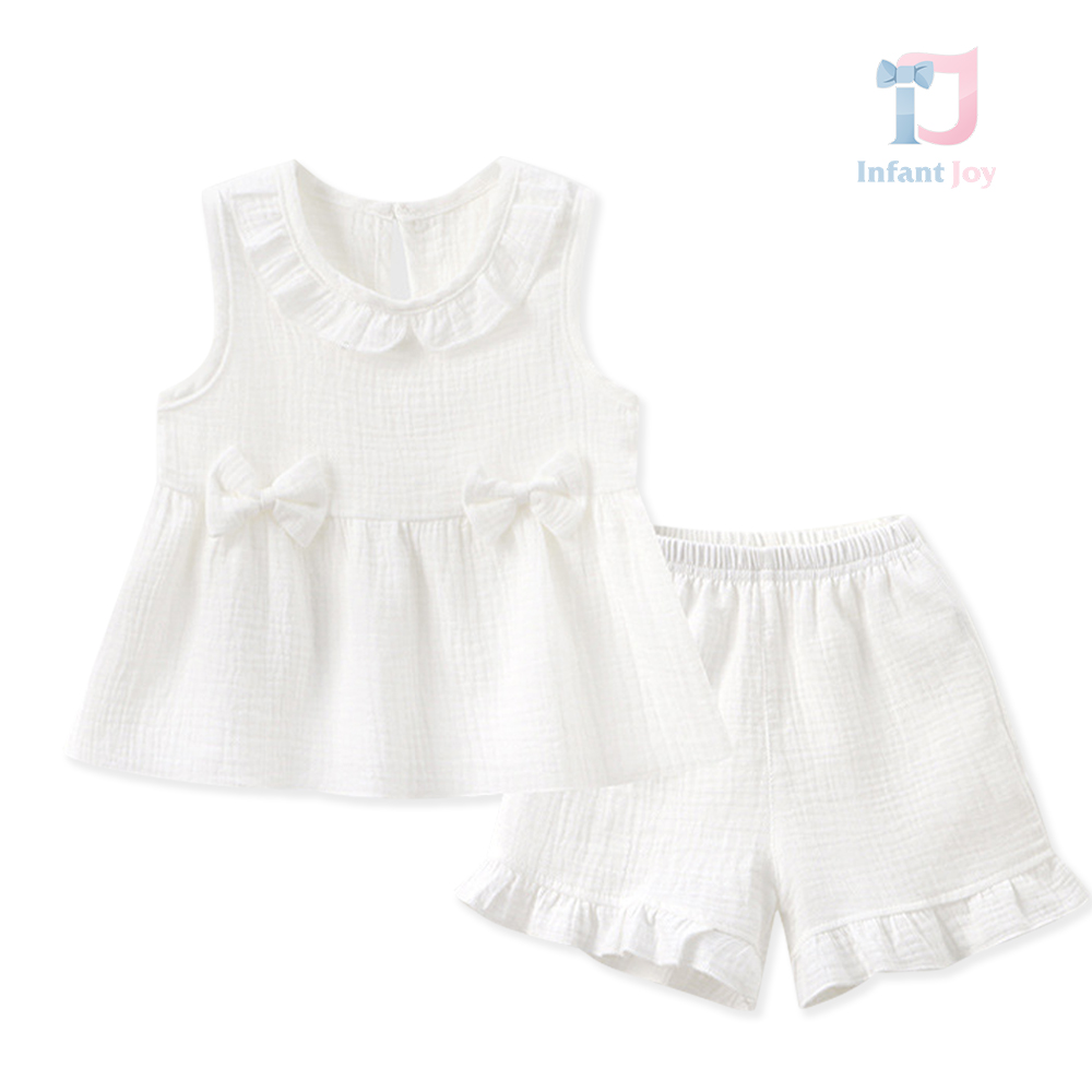Dwuczęściowy muślinowy top z falbankami, kokardkami i spodenkami, komplet White Harmony